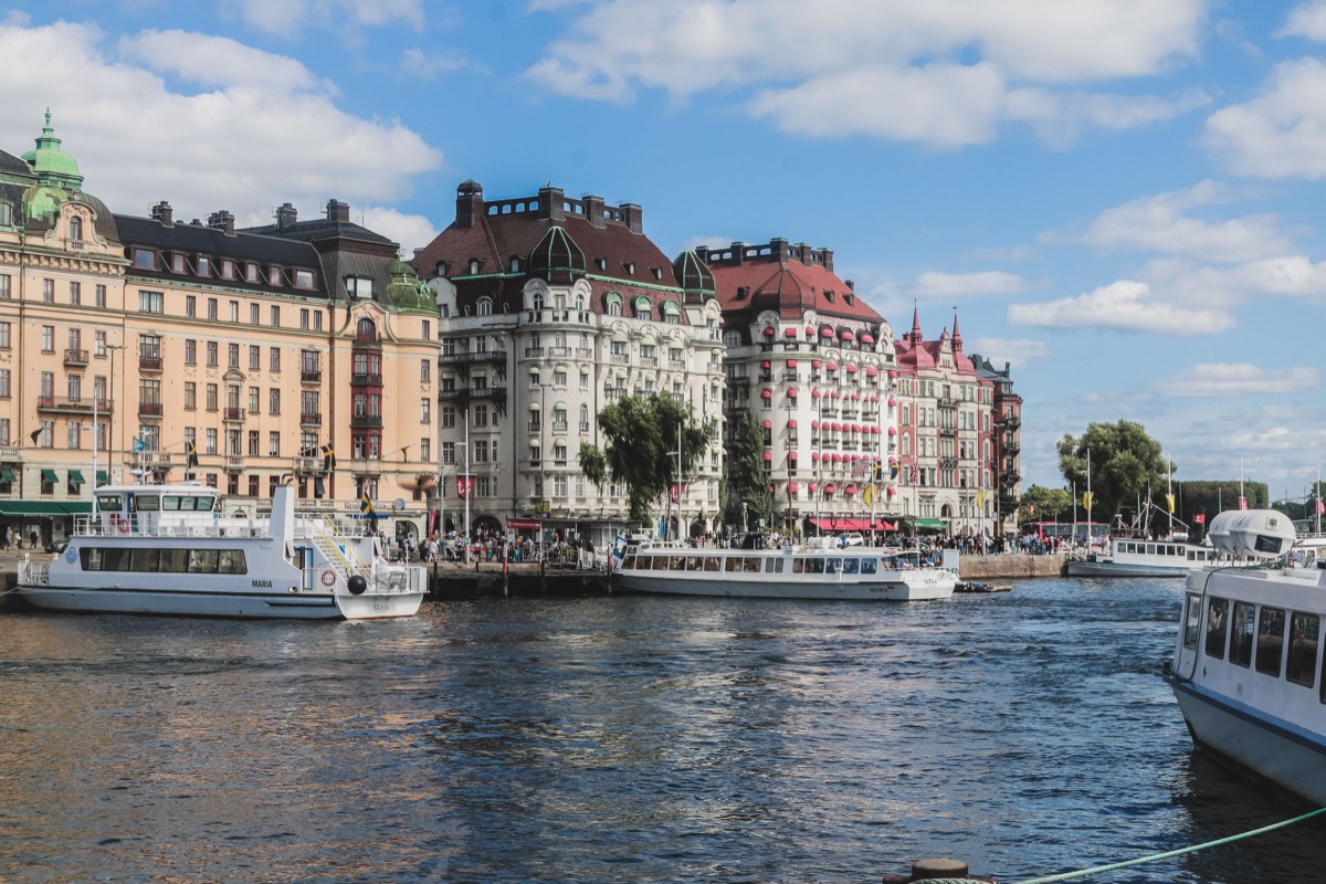 Boats and historic waterfront buildings in Stockholm, Sweden