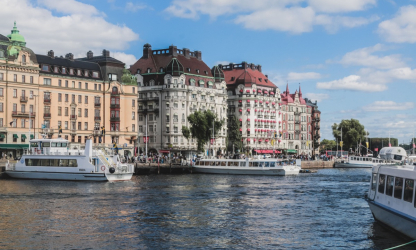 Boats and historic waterfront buildings in Stockholm, Sweden
