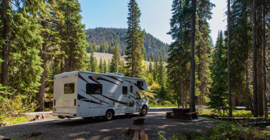 RV with solar panel and solar generator setup